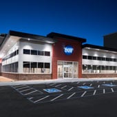 Front view of Dot Foods Arizona distribution center and office at dusk